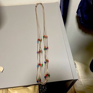 Sliver hue multiple strands of multiple colored beaded necklace